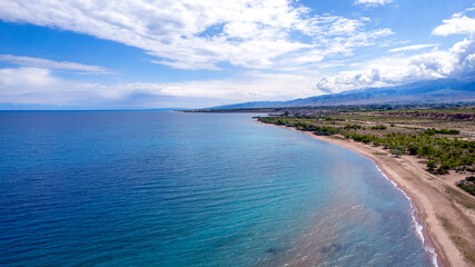 Sunny summer day on the lake. Kyrgyzstan, Lake Issyk-Kul