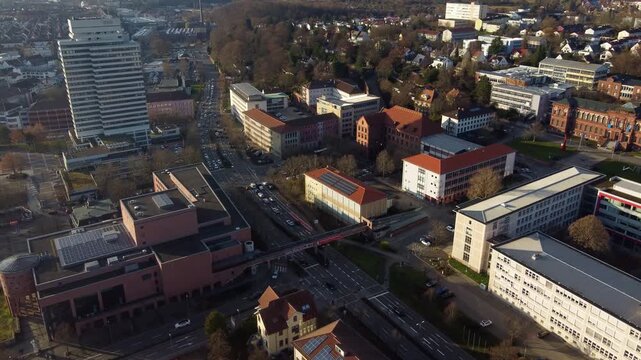 Downtown Street Traffic in Kaiserslautern Town at Golden Hour, Static Drone View