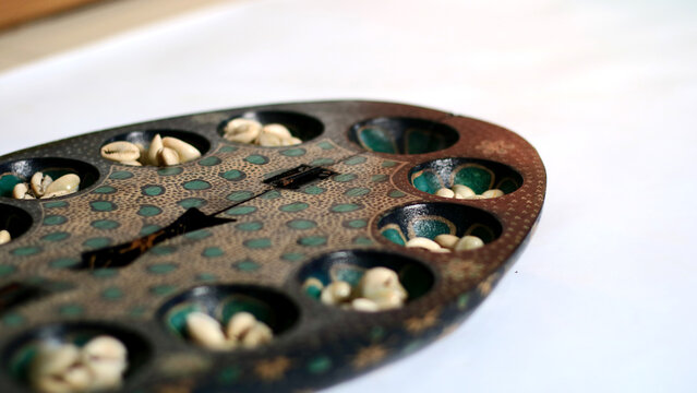Congklak or dakon. Traditional Indonesian game that is particularly popular among children.