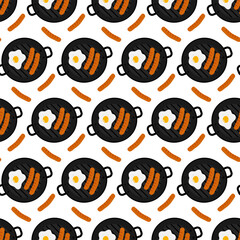 Domestic breakfast with sausages Fried egg in grill pan Top view Seamless pattern Isolated on white