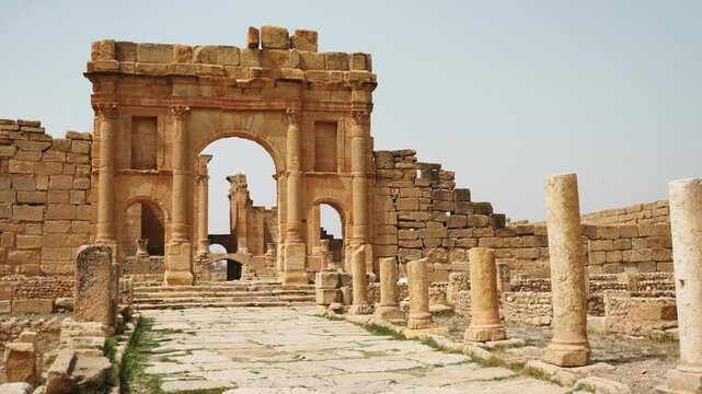 Roman ruins. Arch of Antoninus Pius in Roman ancient city Sufetula in Sbeitla, Tunisia