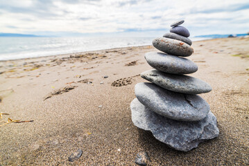 Cairn Along The Beach