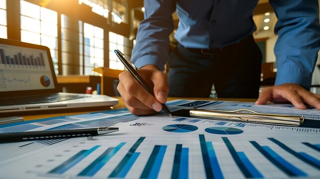 Businessman accountant or financial expert analyze business report graph and finance chart at corporate office Concept of finance economy banking business and stock market research uds : Generative AI