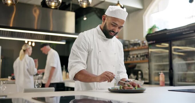 Male chef, kitchen and presentation on plate, cooking and fine dining cuisine. Restaurant, skills and professional career with uniform, art and gastronomy for dishes or meal preparation with tweezers