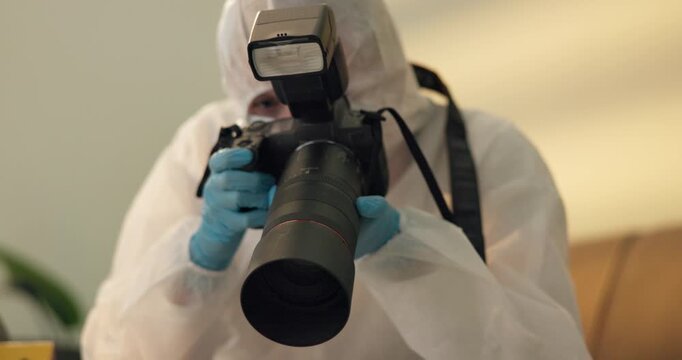 Forensic, photographer and csi at crime scene for investigation of house burglary or murder analysis. Evidence, person and digital pictures in hazmat for observation, examination and case research