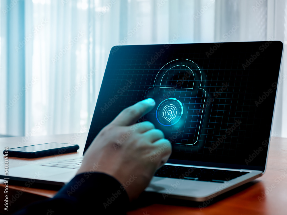 Poster blue fingerprint scan and lock icon on laptop computer screen while finger scanning for security acc