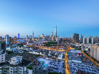 Shanghai Yu Garden and Lujiazui skyline at night