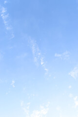 beautiful blue sky and white fluffy group of clouds with sunrise in the morning, natural background