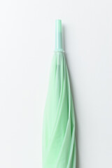 close green umbrella isolated on white background