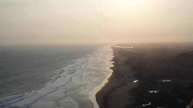High-angle long view of the wave in the Indian Ocean at Parangtritis Beach.