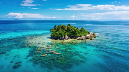 Fototapeta premium Aerial view of a tropical island with crystal-clear water