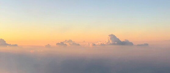 A serene view above the clouds at sunrise, perfect for use in meditation and relaxation themes.
