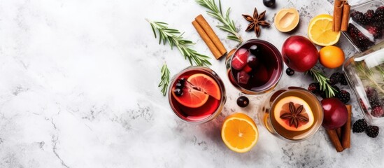 Mulled Wine with Spices and Citrus on a Marble Background