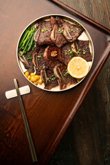rib and various side dishes on the table