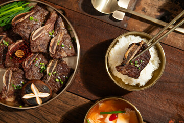 rib and various side dishes on the table