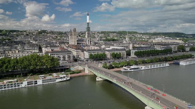 Drone aerial footage of downtown district of Rouen, France. Rouen is a city on the River Seine in northern France. It is the prefecture of the region of Normandy and the department of Seine-Maritime.