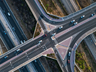 Aerial drone top view photo of highway multilevel junction interchange road. Israel.