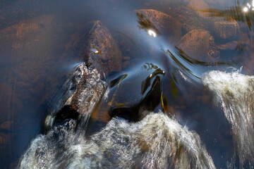 water moving over stones in a river