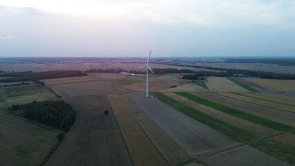Drone view of wind turbine farm generating renewable energy