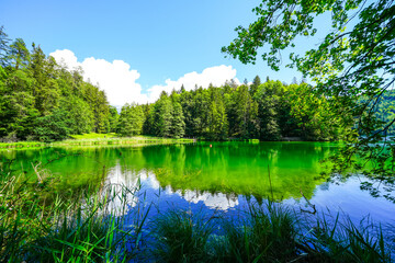 Landscape at Hechtsee near Kufstein. Clear mountain lake in Tyrol, Austria. Idyllic lake with the...