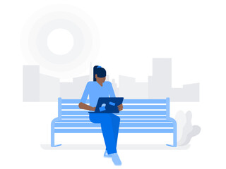 Woman with laptop on the bench