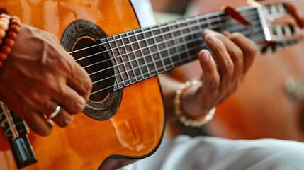 Fototapeta premium Close up of a person playing an acoustic guitar.