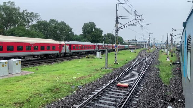 indian railways train on railway track moving 