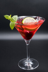 Alcoholic cocktail in a martini glass.