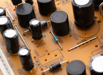 Circuit board with resistors microchips and electronic components background. Computer hardware...