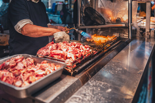 Steak barbecue grill dice beef at Raohe street food night market in Taipei Taiwan