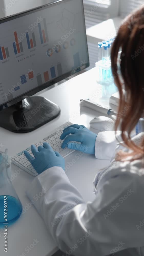 Poster In a laboratory, a scientist conducts research using a computer and a microscope in areas of biology, biotechnology, and chemistry, contributing to advancements in healthcare and pharmaceuticals