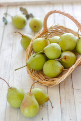 pears on a plate on a white background