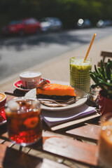 A vibrant collection of coffee, lemonades, ready meals, bistro photography, and desserts. Enjoy gourmet drinks, plated dishes, and sweet treats, perfect for showcasing culinary artistry and café ambia