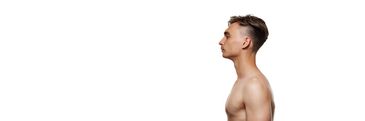 Naklejka premium Banner. Side view portrait of young man posing shirtless against white studio background with negative space to insert text. Concept of beauty, care, cosmetology, wellness, masculinity. Ad