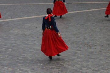  Basque folk dancers in an outdoor event