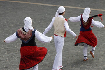  Basque folk dancers in an outdoor event