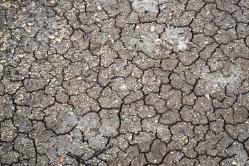 Mud soil cracked by drought view from above