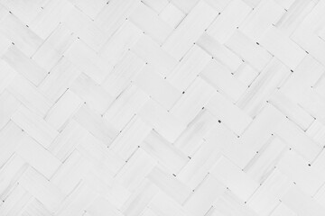 Old white bamboo weaving pattern, woven rattan mat texture for background and design art work.