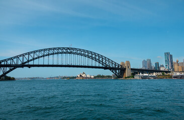 Fototapeta premium View of bridge over river against blue sky, Blues Point Reserve