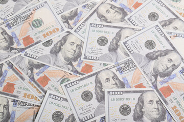 Background of US dollar bills. Top view. American vintage money cash, hundred dollar bills. Texture US dollars