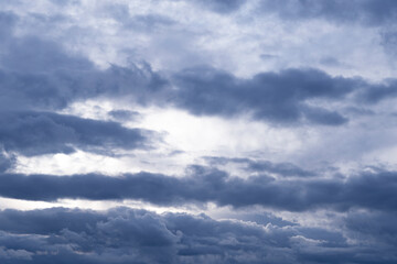 Fototapeta premium Photograph of the blue sky with clouds on a summer afternoon. 
