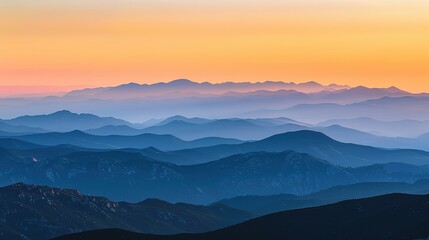 Fototapeta premium Stunning Sunset Over Majestic Mountains, Capturing the Rich Colors and Tranquil Beauty of Dusk