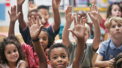 Fototapeta premium A group of students eagerly raises their hands to answer a question posed by their teacher, demonstrating their engagement and thirst for knowledge.