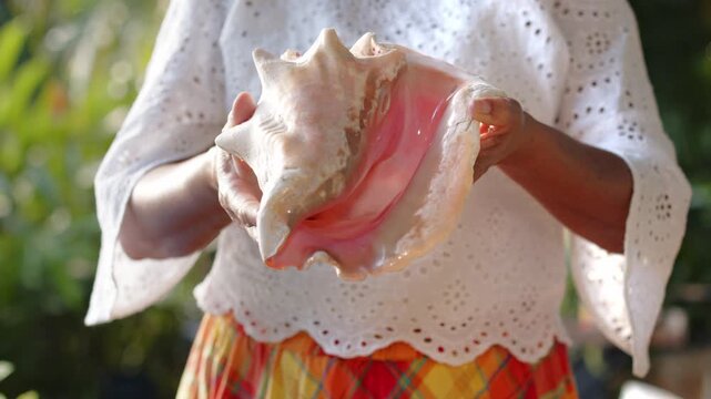 Woman Holding Lambi - Close Up Shot