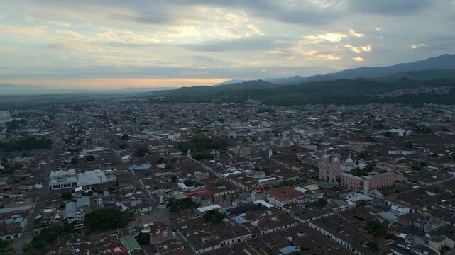 Aerial View Buga Dolly Forward at Sunrise. Establishing Shot. Valle del Cauca Colombia
