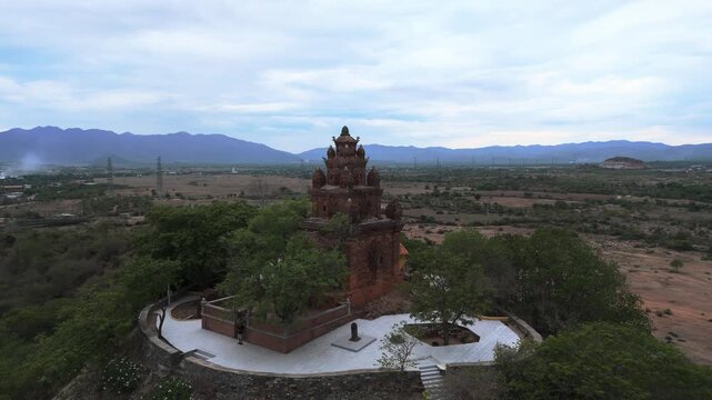 Ancient red brich Cham temple.  Drone aerial rotate, Thap Cham, Vietnam.