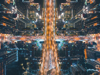 Fototapeta premium City street jam, cars in rush traffic on urban highway. Road traffic in city. Aerial view of road interchange or highway intersection with busy urban traffic. Bangkok
