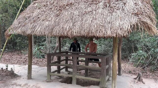 Viet Nam Cu Chi tunnels mannequins display life of the past Viet Cong's base of operations for Tet Offensive in 1968. Famous tourist attraction in Vietnam