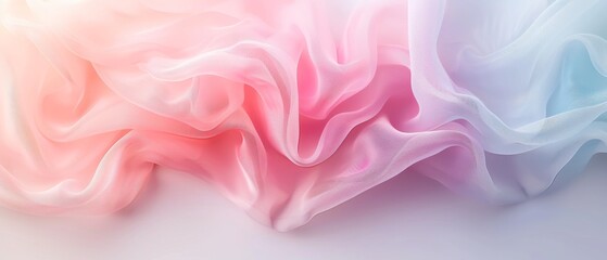 Obraz premium Soft, flowing fabric in pastel hues of pink and blue creates a dreamy and serene atmosphere, perfect for elegant designs.
