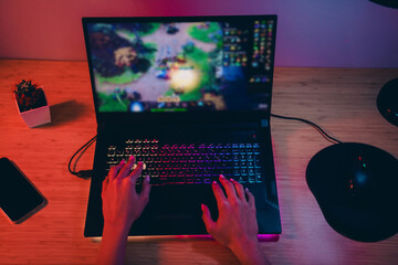 Cropped top view photo of lady arms hands playing computer games indoors room home house © deagreez